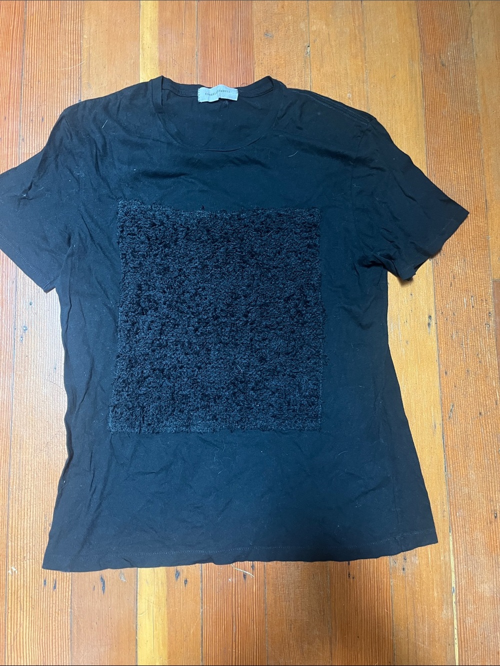 Women's Correll Correll  Black Short Sleeve Tee with Textured Fuzzy Front Panel